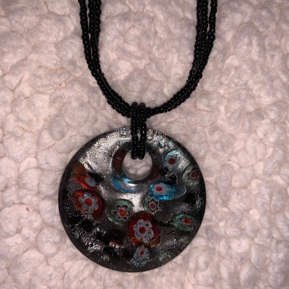 Black necklace with deep floral accents